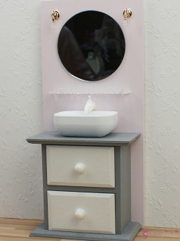 szafka łazienkowa z okrągłym lusterkiem i lampkami